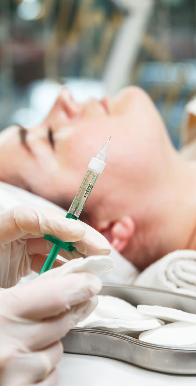 Face with syringe photo.